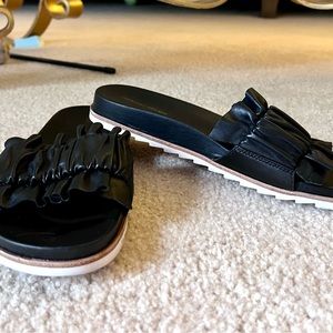 Antonio Melani black leather ruffle slides